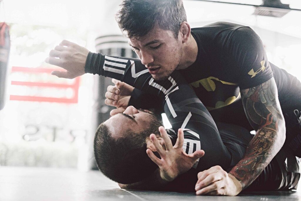 BJJ World Champion and ONE Superstar Bruno Pucci practices an arm triangle. 