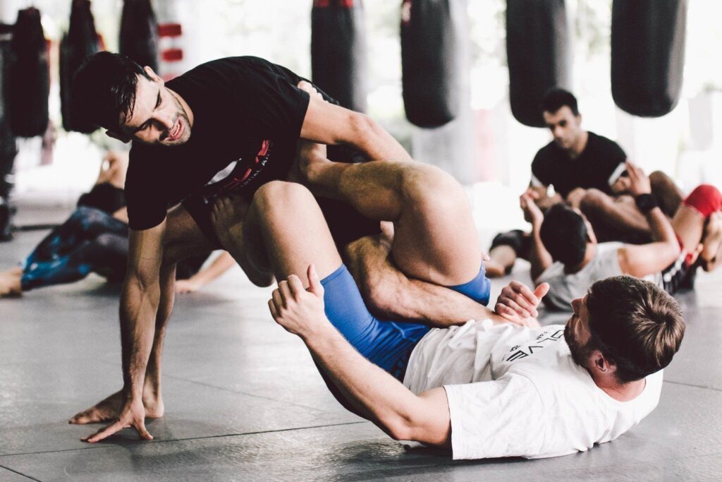 ONE Superstar Jake Butler and BJJ Nationals Champion Eduardo Novaes work on their submissions at the Evolve MMA Fighters Program.
