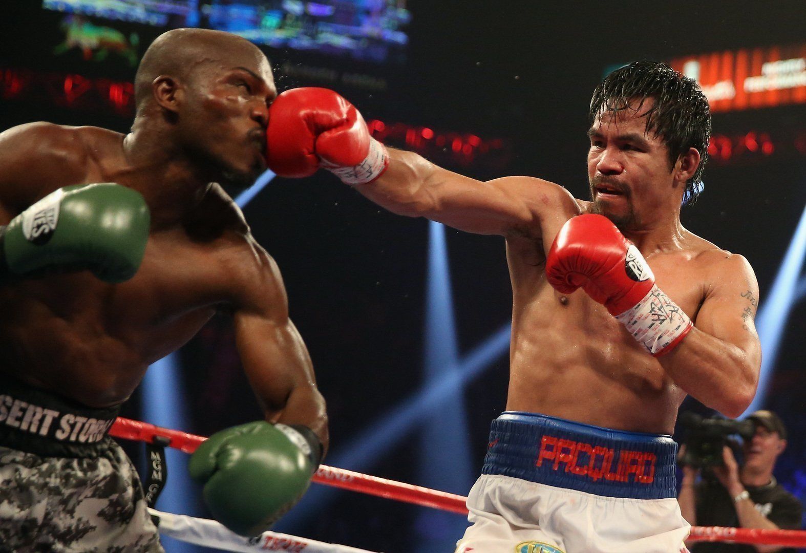 LAS VEGAS, NV - APRIL 12: Manny Pacquiao throws a right hand at Timothy Bradley at the MGM Grand Garden Arena on April 12, 2014 in Las Vegas, Nevada. (Photo by Jeff Gross/Getty Images)