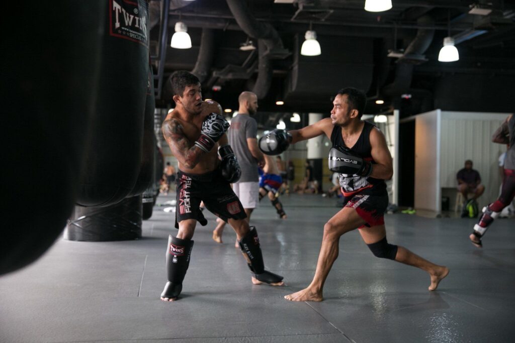ONE Superstars Alex Silva and Dejdamrong Sor Amnuaysirichoke work on their striking at the Evolve Fighters Program.