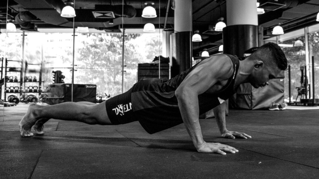 Amir Khan doing a push up in the gym