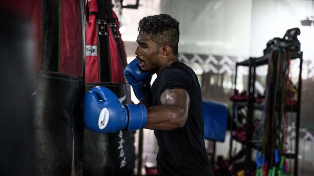 Amir Khan punching the heavy bag