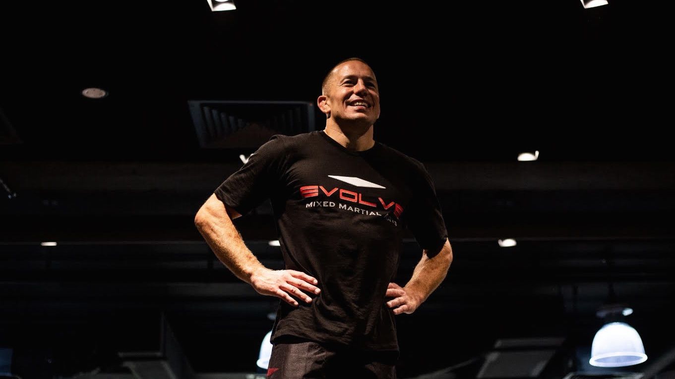 MMA fighter Georges St Pierre standing with his hands on his hips