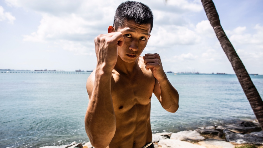 https://cdn.evolve-mma.com/wp-content/uploads/2021/11/hiroki-six-pack-abs.jpg