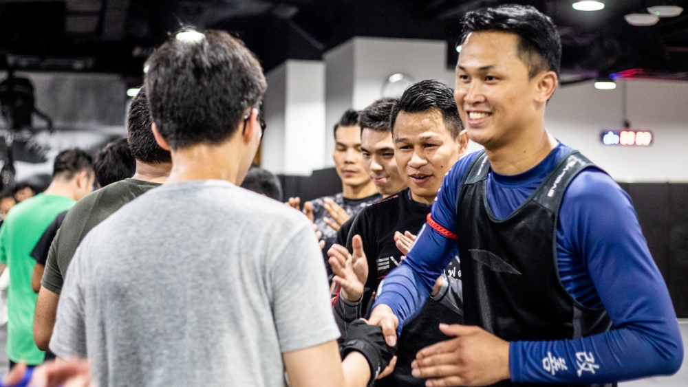 Students paying respect after a Muay Thai Class at Evolve MMA.