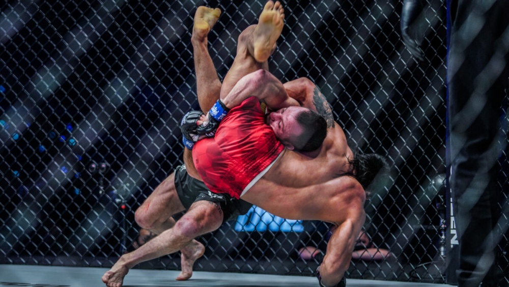 Explosive Takedown Transitions: When And How To Mix Wrestling Into MMA Striking