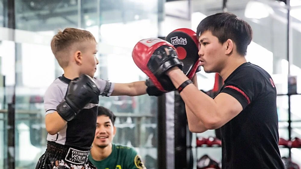 Children training martial arts at Evolve MMA